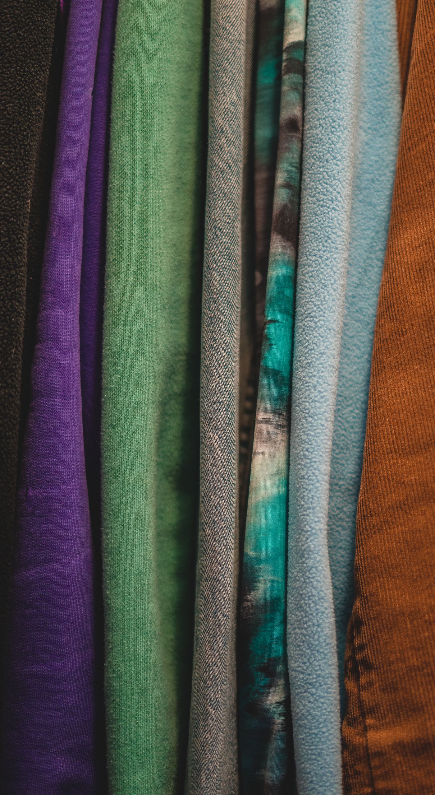 Bolts of fabric in many colours