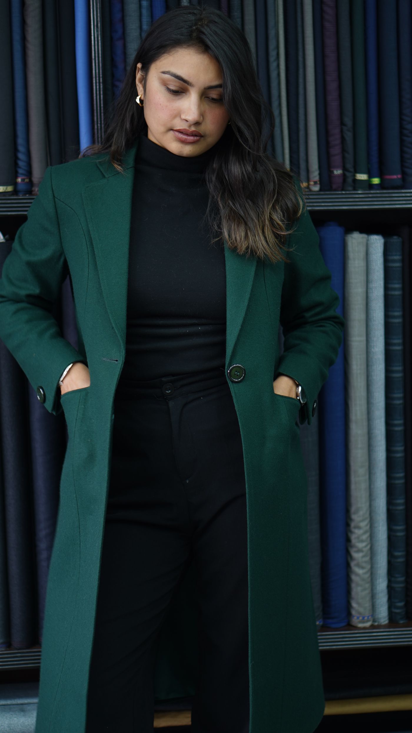 A tailored green coat